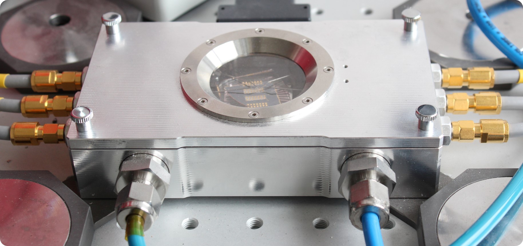 Nextron micro-probe station with heating control, to measure the resistance-temperature characteristics. The measurements are performed of a PXIe-4142 4-channel 
